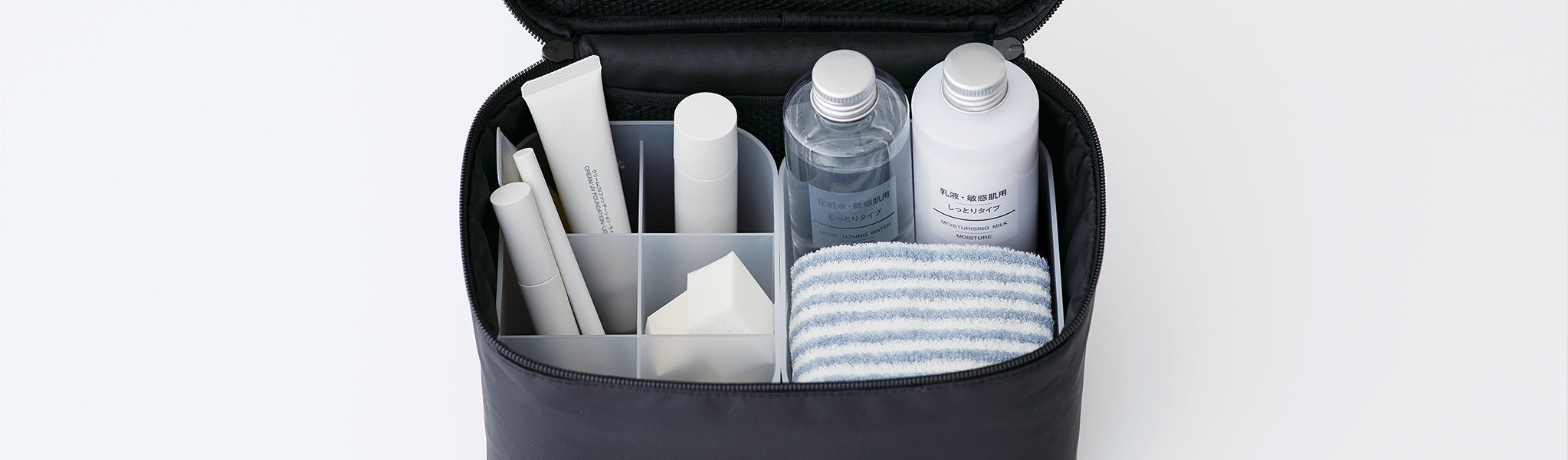 Open nylon makeup box with a variety of health and beauty items inside