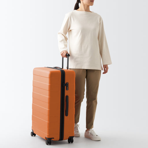 Adjustable Handle Hard Shell Suitcase 105L - Smoky Orange | Check-In MUJI